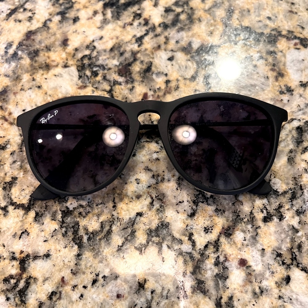 Woman’s Ray-Ban black sunglasses. They are polarized and in great condition